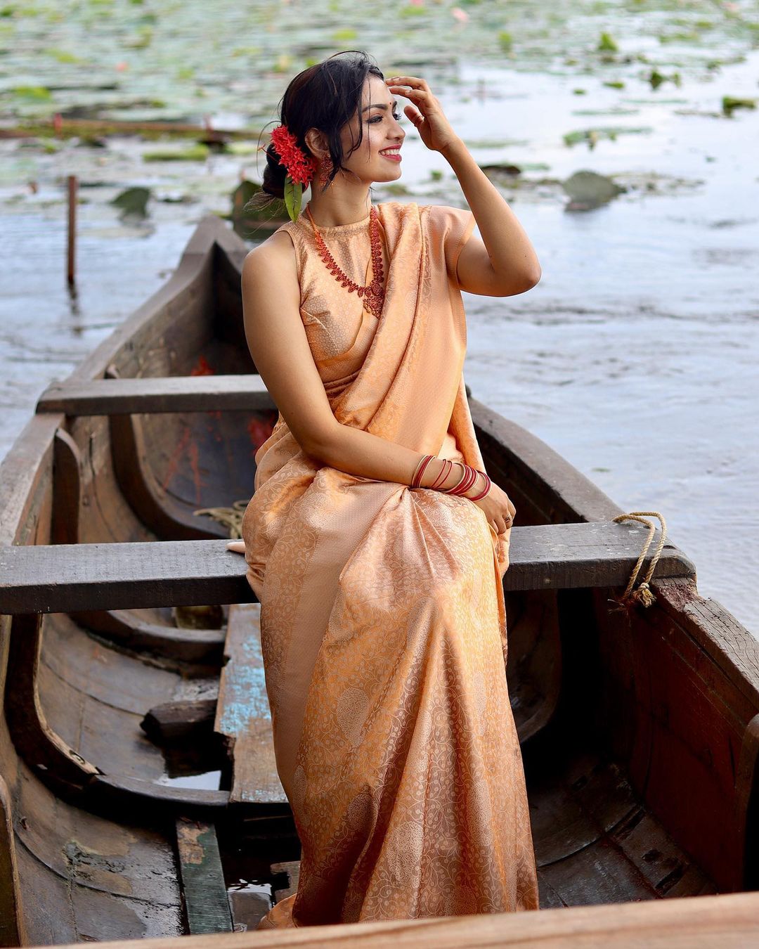 Phenomenal Light Orange Soft Banarasi Silk Saree with Blouse Piece