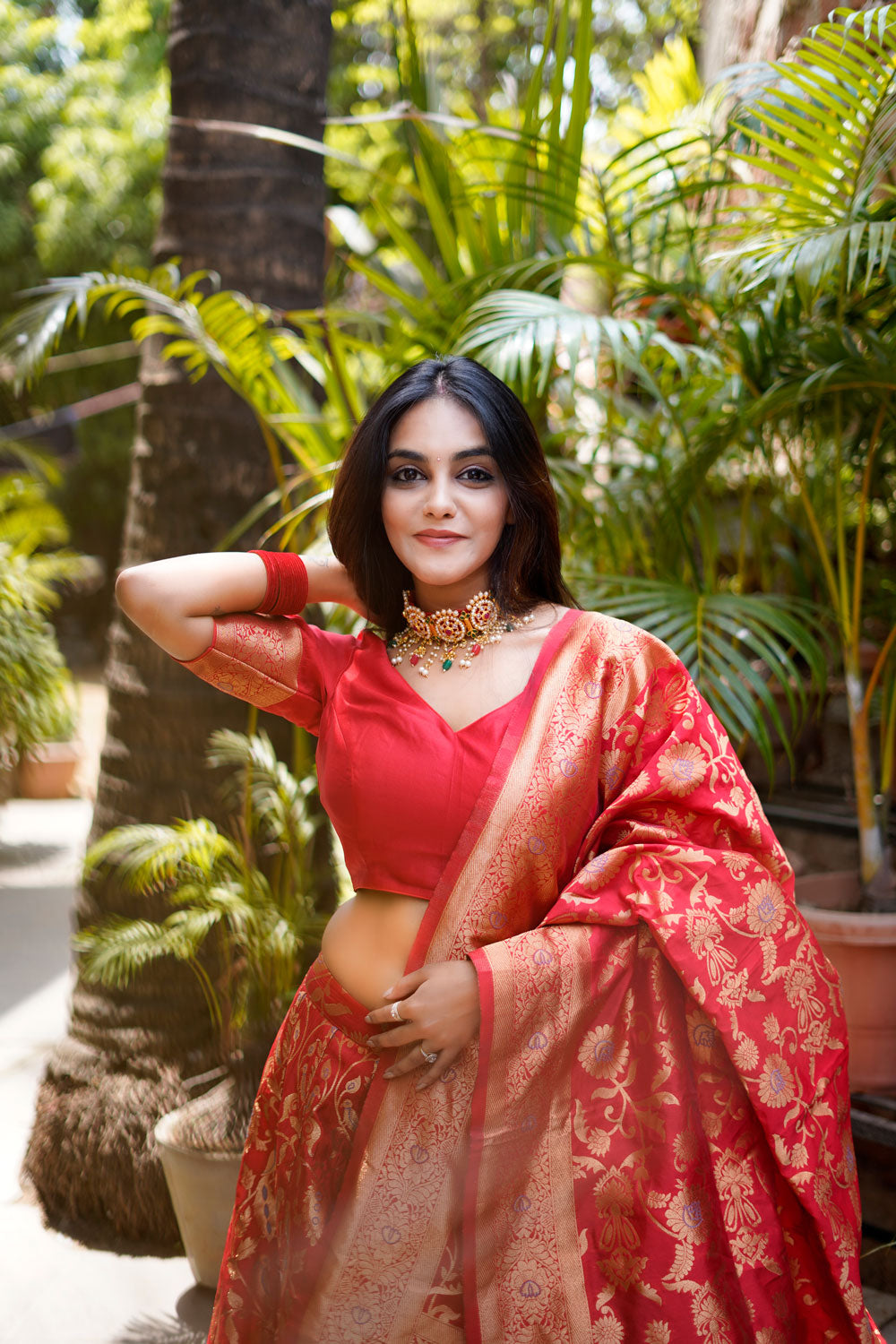 Regal Red Bridal Lehenga Choli Weaved with Golden Zari